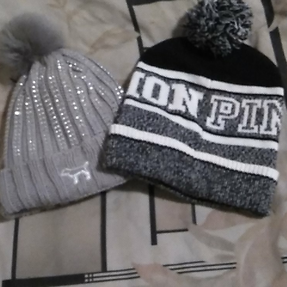 Two pink victorias secret hats